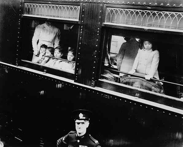 The Dionne Quintuplets arrive in Toronto for presentation to Her Majesty Queen Elizabeth. Toronto, Canada.