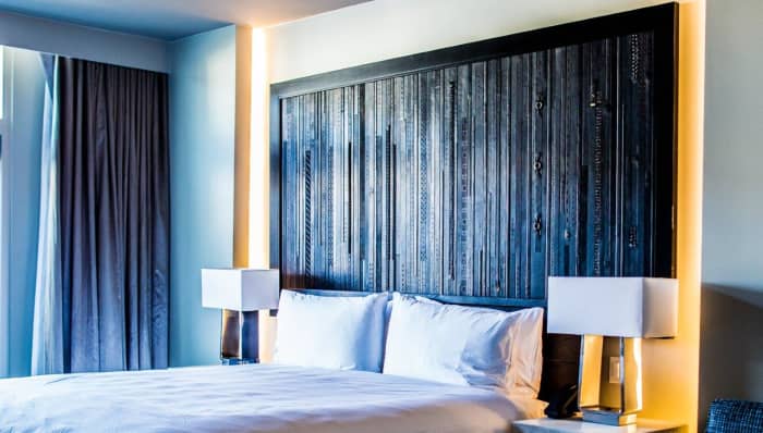 Used black leather belts and headboards were purchased from secondhand markets and gifts from collaborators to create this piece.