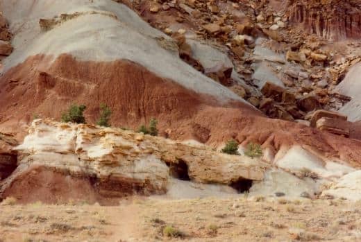 The two dark openings are entrances to uranium mine tunnels in Capitol Reef National Park.