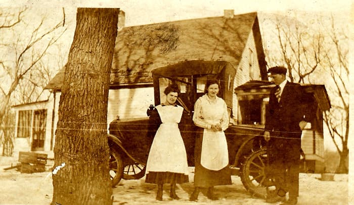 This car might have been similar to the one mentioned in this story. In the photo are my husband's grandparents plus another person in the middle.
