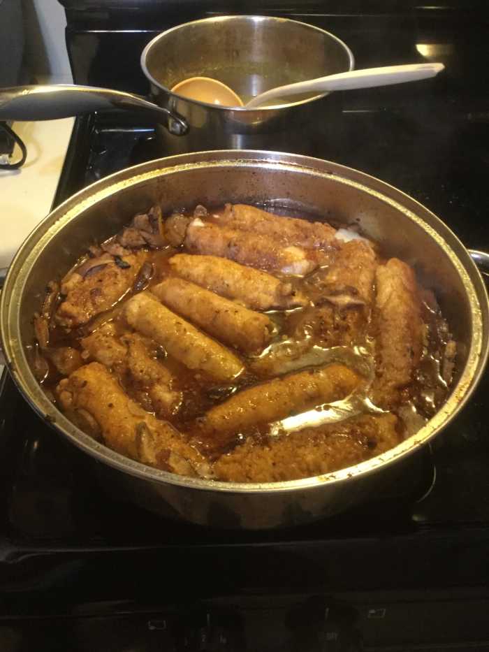 Once Rollatini is lightly pan-fried on all sides, add the mushrooms, white wine, chicken broth (or beef broth) and chopped tomatoes