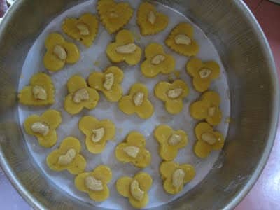 You need not space the cookies out since they will not spread out when baking.