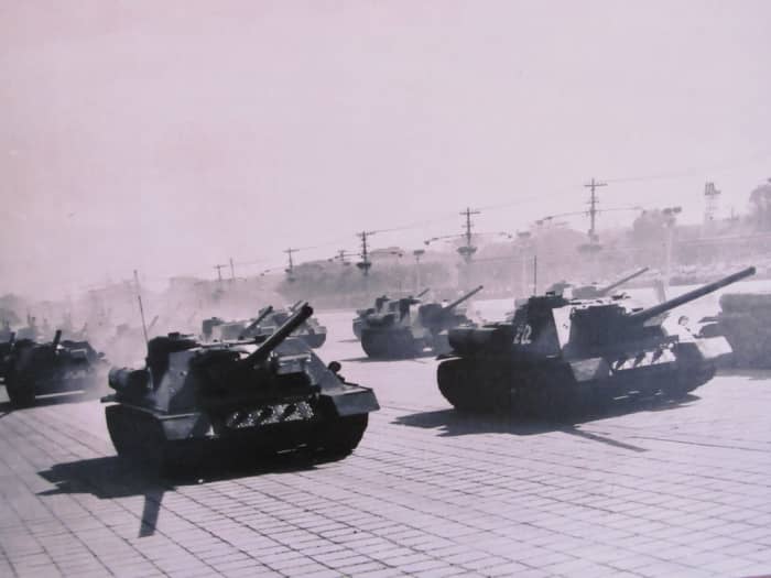 Chinese SU-100s on parade in the 1950s. Wargame Red Dragon's game mechanics make 1940s tank destroyers still relevant on a 1990s battlefield.