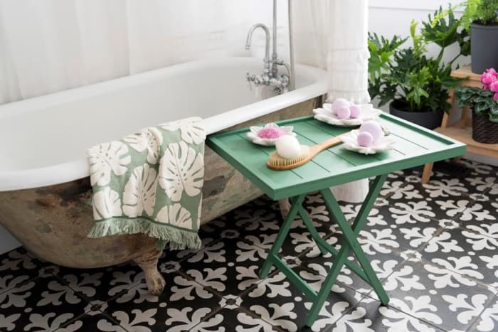 With standalone bathtub being all the rage lately, a small wooden tray is a great way to change up the ambiance of the bathroom.