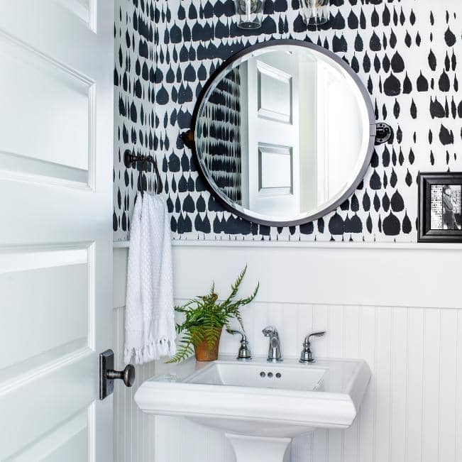 When you've completed all of the upgrades, you can begin planning the interior of your powder room. The black and white color scheme is timeless and works well in every print or pattern.