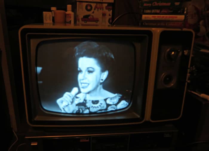 . The Best Of Judy Garland Movie CED Selectavision Video Disc, is what is playing on the television and player.