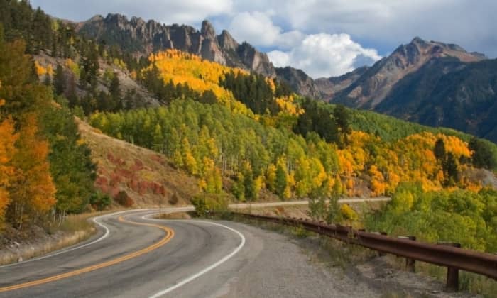 The San Juan Skyway passes through Telluride, Durango, and Silverton while traversing high-alpine passes and stunning mountain landscapes. It is known as one of the best scenic drives in the world.
