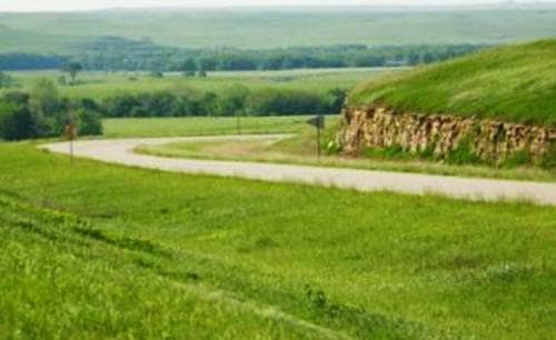 The Kansas starts with wide-open fields and unobstructed views of rolling hills blanketed with lush prairie grasses, wildflowers, and the wonderful horizon.