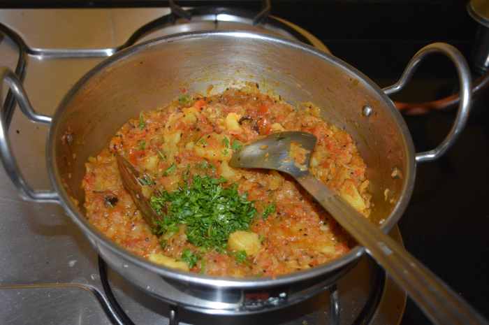 Add chopped coriander leaves. Mix well and turn off the heat.