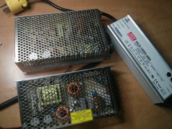 I am using the power supply shown on the left. The one on the right is water-resistant, and will be used in production models.