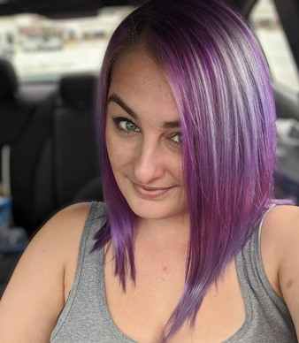 Me with my angled long bob cut in 2020.