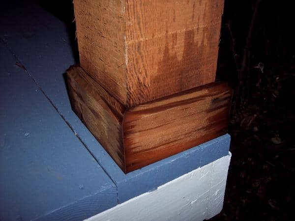 The 6x6's are held on to the deck by metal brackets which are in-and-of themselves very unstable. A light breeze would blow them down if they were not stabilized by the braces above. The proper way to do this is to bury the 6x6 in a 4' deep concrete