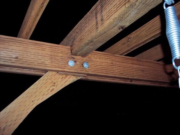I used bolts and blocks to pin the braces and beams together and the 4x6 on top is notched to slip down securely over the assembly (I actually had to hammer it down into place).