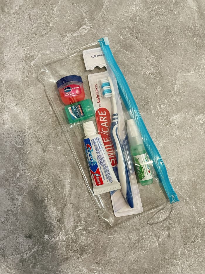 I admit that I am super compulsive about being clean, including my mouth and teeth. I carry these essentials on board so I can brush, floss, and feel fresh on the airplane.