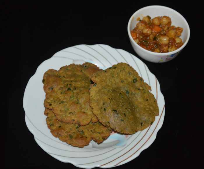 Bajra methi poori served with sweet and mildly spicy chickpea curry