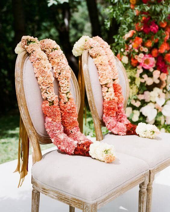 Also known as El Lazo ceremony, this ritual is done by Filipinos, Mexicans, and Spaniards during their weddings. In this ritual, a floral rope will be wrapped around you and your spouse in the form of a number eight figure to represent unity.
