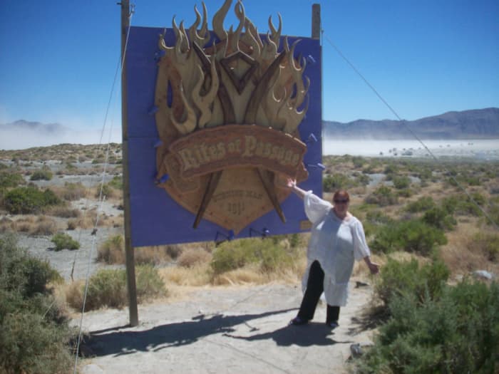 I thought it was amusing to wear a white gown to my virgin year at Burning Man. Especially since they make you roll in the dust when you first get there.