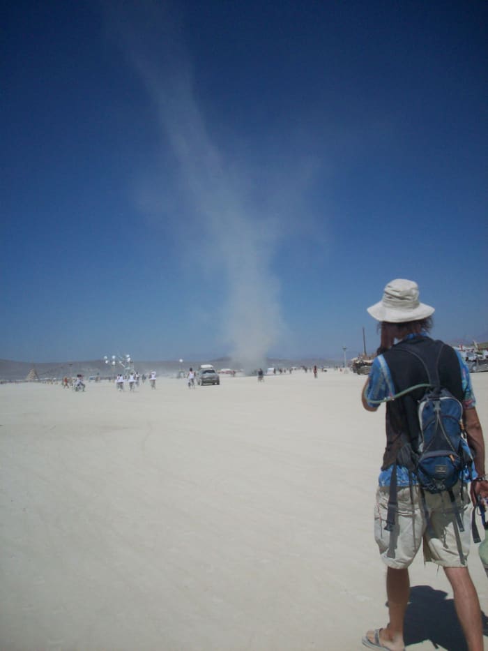 A smart Burner should never be without a good sunhat, sunglasses, and his hydration backpack. In that pack he also has goggles and a dust mask in case that dust devil turns into a dust storm.