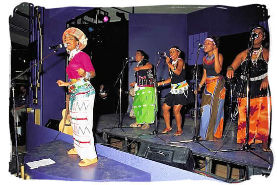 a Capella and traditional songs. south African Music, is now a Fusion of South African Music cultures as can be seen in the mixed traditonal garb.