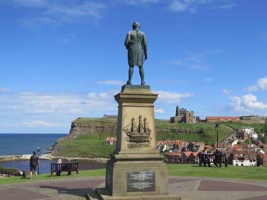 Captain James Cook RN, Fellow of the Royal Society by virtue of the role he played navigating his ships across relatively unknown seas. He gazes out from his plinth on Whitby Westcliff