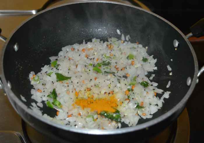 Add turmeric powder and mix well.
