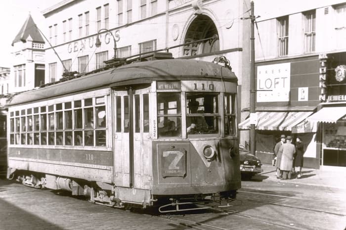 No. 7 trolley winds its way up Main Street heading toward Yonkers Avenue in Yonkers, N.Y. Genung's Department Store can be seen in background. Trolleys were replaced in Yonkers with buses in November 1952.