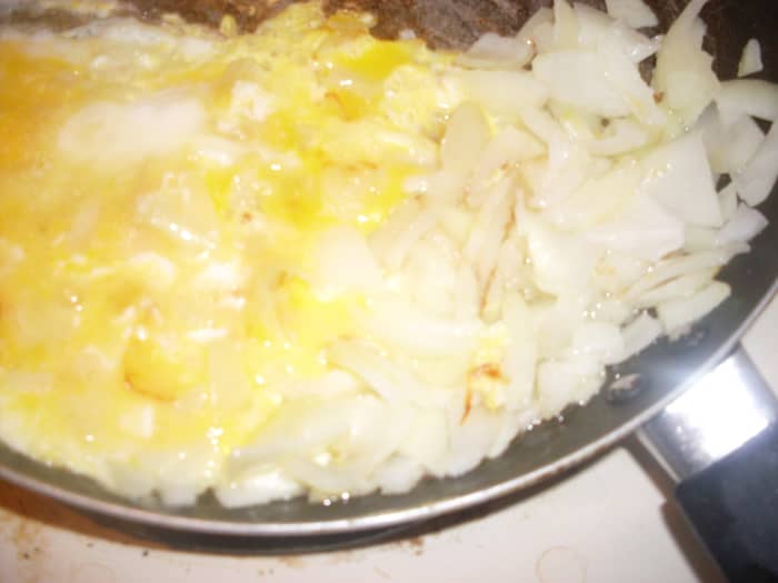 A generous amount of eggs is used for this flavorful and delicious fried rice. The onion flavor is abundant and enjoyable in this fried rice.