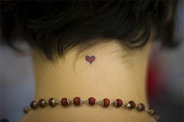 A tiny tattoo can be discreet, awesome and meaningful. Explore a few tiny designs, from hearts to ladybugs.