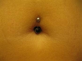 This is healed, so I added a jewel, but it gives you an idea of the standard size when first pierced. Not as bad as you feared, right?
