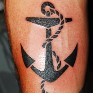 Anchor tattoos are some of the most common and classic designs out there. This monochromatic, stencil-style anchor tat presents a well-known icon in a fresh way.