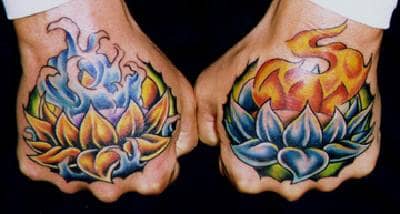 These fire and water tattoos are unique because of their placement and their incorporation of lotus flowers.