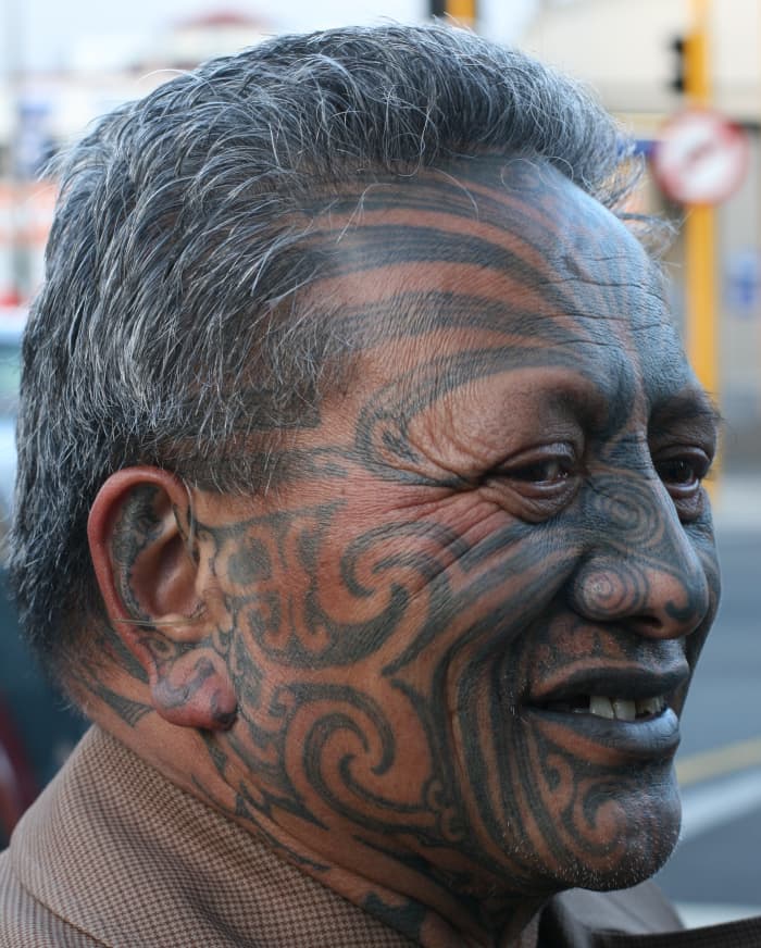 Maori activist Tame Iti, photographed in 2009 in Wellington, New Zealand. Full-face tattoos such as this convey information about social rank as well as skills and achievements.
