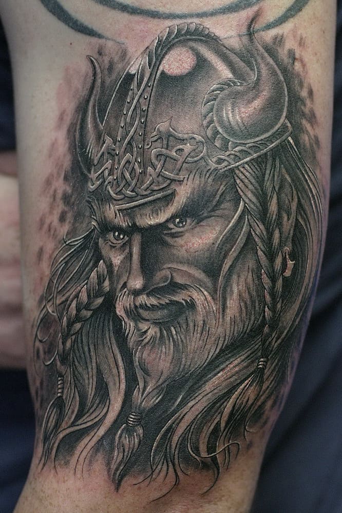 This Viking tattoo looks so alive due to its high detailing and brilliant use of black and white colors.