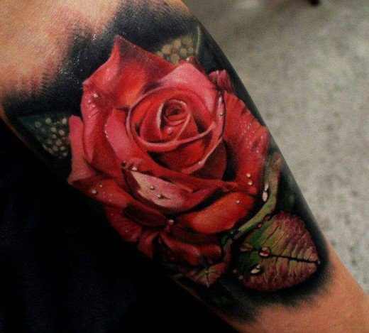 Rose tattoo on underarm