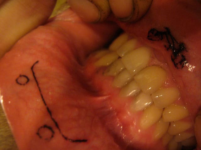 Lip tattoos are both extremely painful and difficult to show off—so they're not recommended for just the casual tattoo enthusiast.