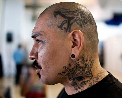Dragon tattoos on this man's head caused many painful moments!