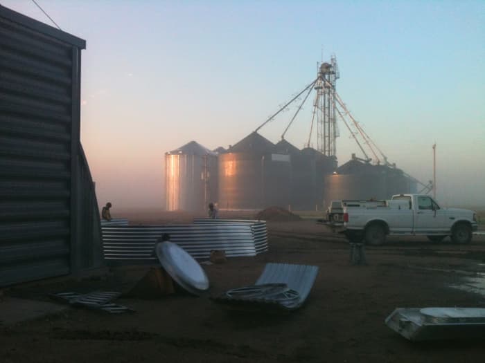 Lovely grain bins at sunrise are among my favorite views. My husband and I built or worked on most of this cluster, as well as many others.