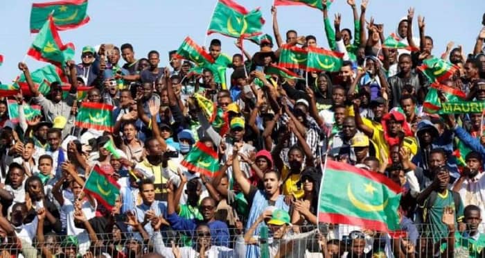 Fans in attendance celebrate during a qualification match between Mauritania and Botswana in Nouakchott, Mauritania, on Nov. 18, 2018. Mauritania won the match 2-1 to qualify for the 2019 Africa Cup of Nations.