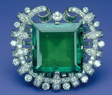1950 platinum brooch by Tiffany and Co. with 75.47 carat Colombian emerald and 13 carats white diamonds.
