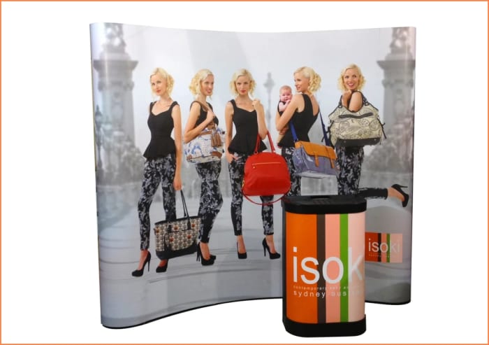 A curved pop up booth back wall is a simple to assemble kit providing an eye-catching and inexpensive backdrop.