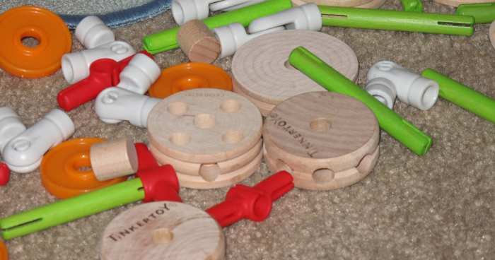 The new TinkerToy comes with classic wooden shapes and connectors but add several fun new pieces as well, including wheels and hinges.
