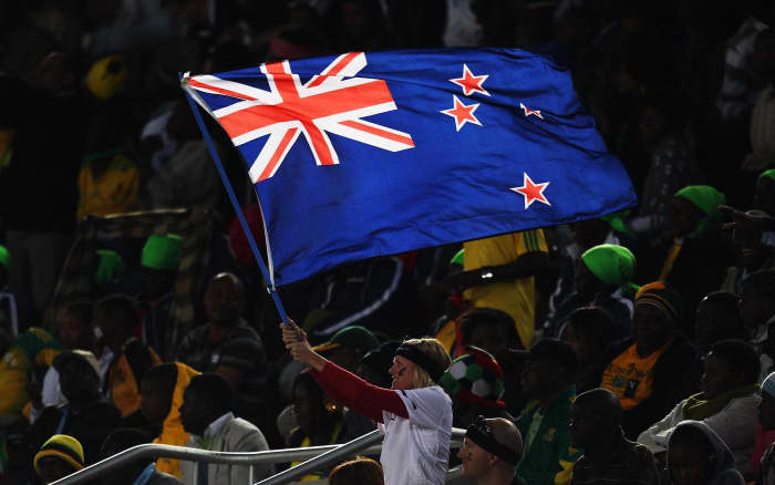 A fan waves New Zealand's flag during a World Cup match against Paraguay in Polokwane, South Africa on June 24, 2010.