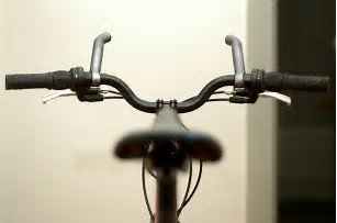 Note how some bar ends fit on the end of the handlebars and some as these shown fit closer to the middle. Bar ends being shown on the handle bars from the riders view.