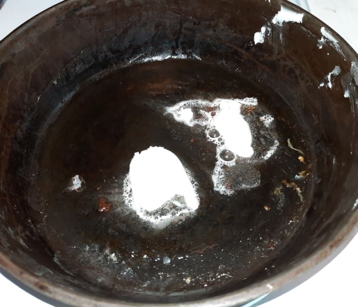 Those nice meat blobs are little pieces of bacon from the saved bacon grease. The Crisco and bacon grease melt together beautifully.