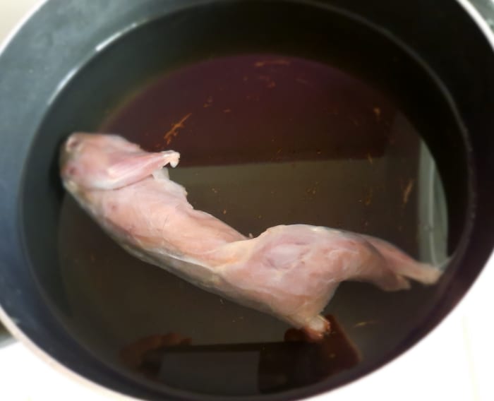 I prepped the meat in water to tenderize it. I placed the pot in the refrigerator for many hours. It is hoped that this will soften the meat.