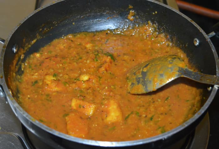 Turn off heat. Your favorite sweet corn and stir-fried paneer curry is ready to eat! Collect it in a serving dish.