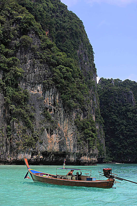 Long-tail boat in the Andaman Sea. This photo was taken in the Phi Phi Islands, where rock climbing, kayaking, snorkeling and diving, are all options to try