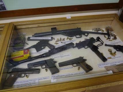 Various handguns including a Colt 1911 and a Mauser C96. In this case there is also a Sten SMG and Ingram Mach 10 SMP