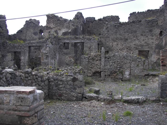 "Sue, his assistant, was busy photographing the excavated remains of a nearby brick building when she heard his utterance over her headset. She rushed to his side."