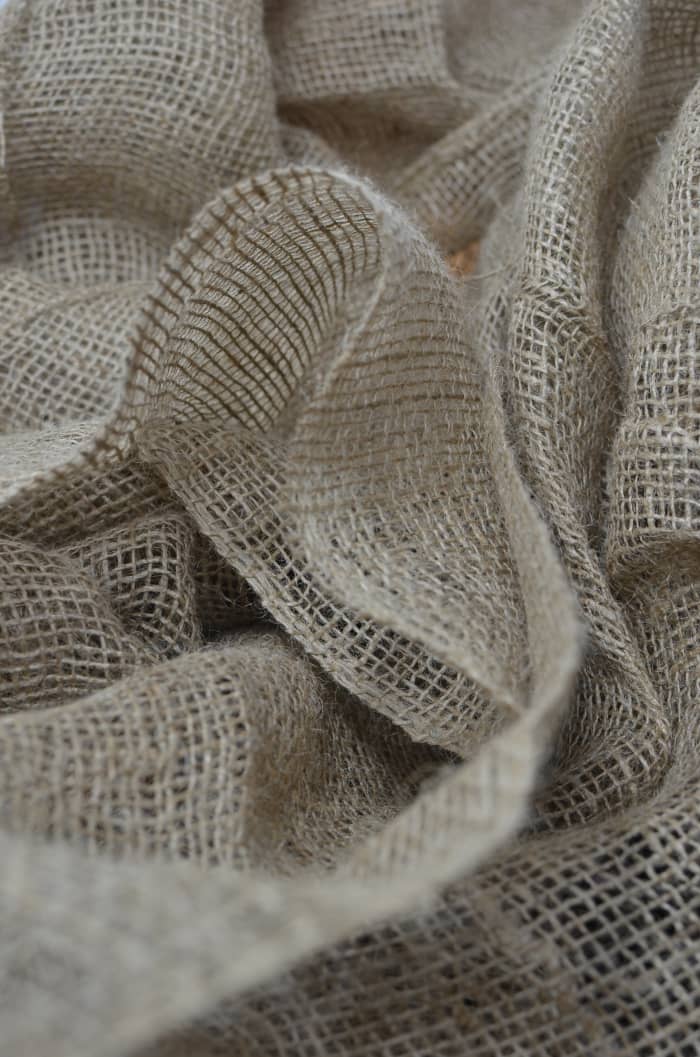 Use burlap for an environmentally-friendly wrap that can be reused. Photo by Skylar Kang from Pexels
